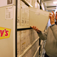 A Denny's archivist pulls cards from climate-controlled storage for scholarly review.